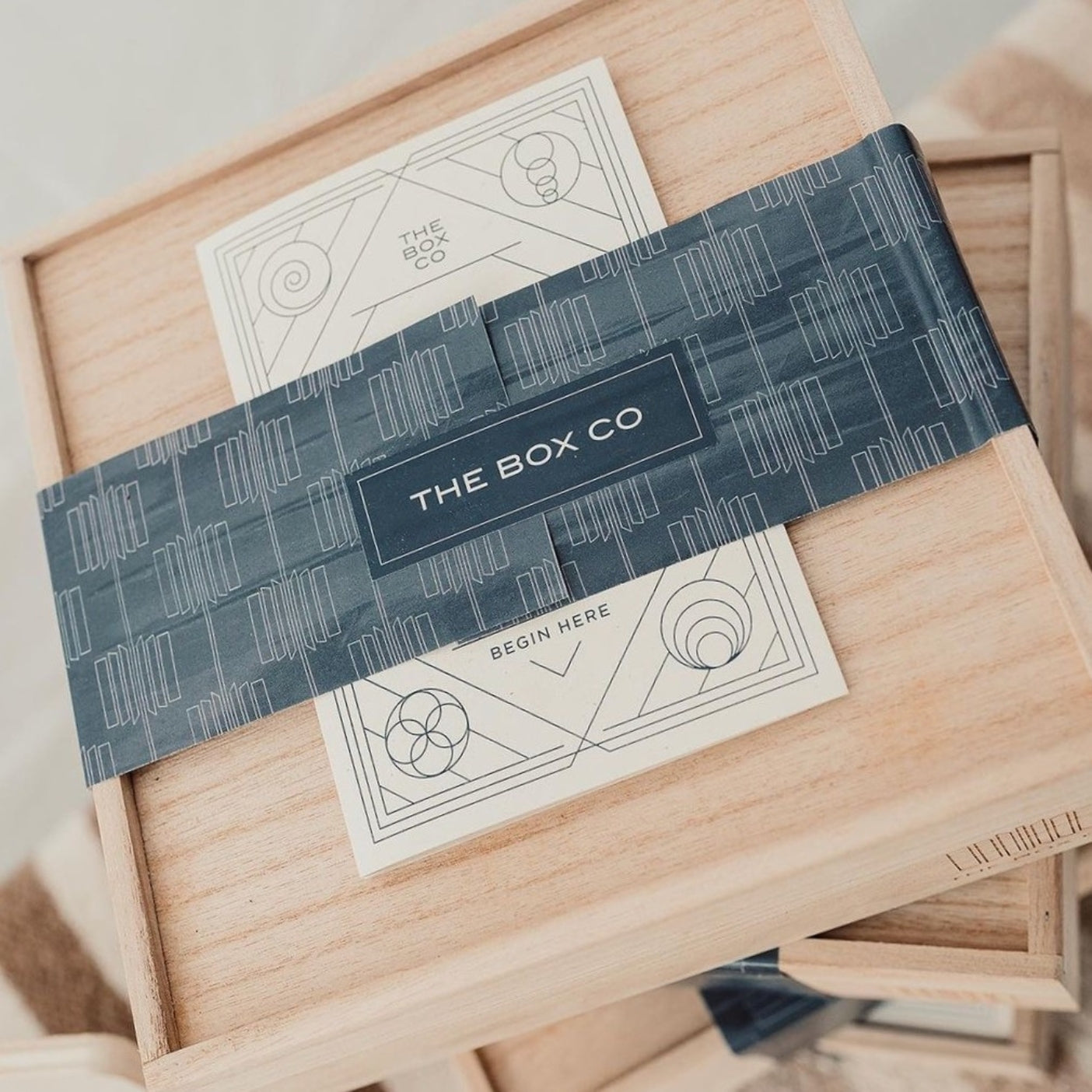 The Comeback Box wooden lid and packaging.